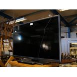 A Mitchell & Brown 32inch TV complete with remote