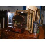 An antique toilet mirror together with a triple dr