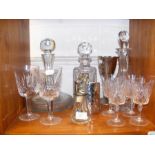 A ships decanter together with assorted wine glass