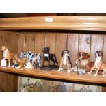 A collection of dog ornaments including Beswick