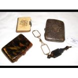 Lorgnettes, a silver cigarette case, etc.