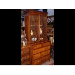 A 19th century glazed bookcase with two short and
