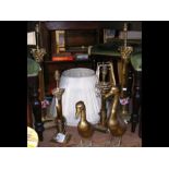 A pair of large brass Corinthian column table lamps, two brass ducks ornaments etc.