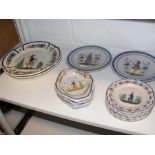 An assortment of Quimper and similar plates