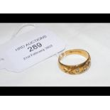 A diamond ring in 18ct gold setting