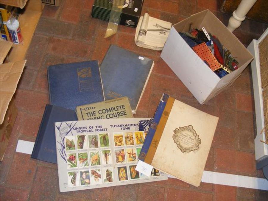 The Complete Flying Course by Harben, together with other volumes, and a box of loose Meccano