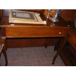 An antique mahogany desk with rising lid, fitted interior and cabriole legs - width 100cms