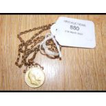 A 1906 gold half sovereign coin on chain