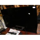 A JVC 40" full HD LED backlit LCD TV - model LT-40C590 - complete with remote