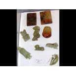 Two carved jade panels together with carved jade a