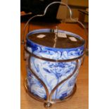An early 20th century William Moorcroft Florian Ware biscuit barrel with Art Nouveau plated surround
