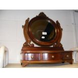A reproduction toilet mirror
