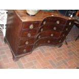 A Georgian mahogany concave fronted chest of drawe
