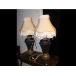 A pair of table lamps