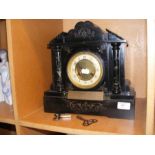 A Victorian slate and marble mantel clock - 31cms