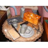 A tortoiseshell tea caddy, pewter plates and other