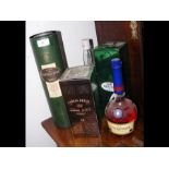 A cased bottle of Glengoyne Malt Whisky, a cased b