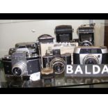 A collection of Balda cameras together with others