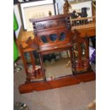 A Victorian walnut overmantel