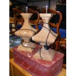 A pair of wooden table lamps together with vintage