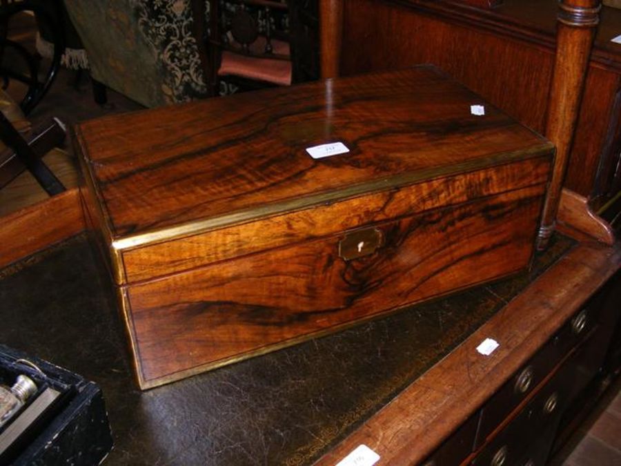 A Victorian walnut and brass bound writing slope w