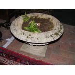 A stoneware classical style garden urn - diameter