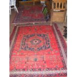 Two Middle Eastern rugs - one very worn