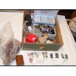 A box of collectables including costume jewellery,