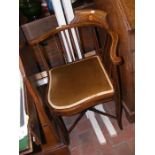 A late Victorian inlaid mahogany corner chair