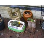 A bird bath, terracotta strawberry planter, 'campe