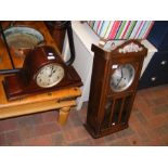 A 1920's oak two train wall clock, together with a