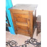 An oak single door cupboard in antique style - wid