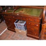 A Victorian mahogany pedestal desk with nine drawe