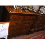 A period walnut chest of three short and three lon