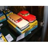 A boxed Corgi Plymouth sports car - No. 219, toget