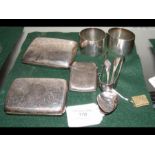 An assortment of silver including two card cases,
