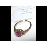 An oval ruby? ring