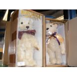 A boxed collectable Merrythought Teddy Bear and on