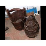 An old metal bound and wooden bucket, together wit