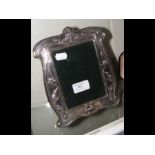 A modern silver photo frame in Art Nouveau s