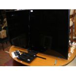 A Hitachi 55 inch Smart 4K LED TV - Model 55HK6100U - together with Sony DVD Player