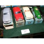 Four boxed Corgi die cast model vehicles in early
