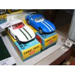 Two boxed Corgi Marcos 1800 G.T's with Volvo engin