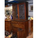 A mahogany secretaire bookcase with glazed top, two drawers a