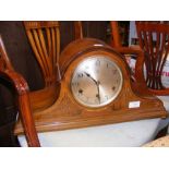 An inlaid 'Nelson's hat' striking mantel clock