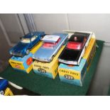Three boxed Corgi Olds Mobile models - No. 235, Su