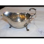 A silver sauceboat with Sheffield hallmark