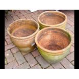 Three terracotta pots