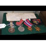 Four Second World War medals awarded to Kenneth M