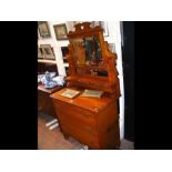An Edwardian dressing table with mirror over